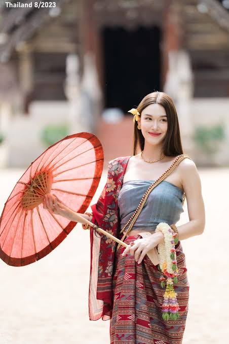 Thai traditional dress and parasol